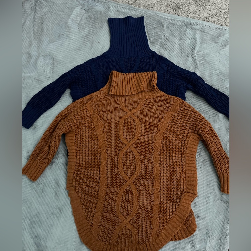 2 Express sweaters . Small and mediums